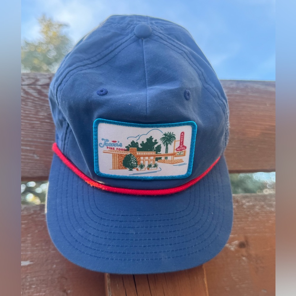 Joann’s six panel snapback cap with custom artwork patch in Navy
